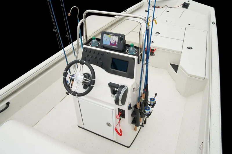 Slide: The Image of Manufacturer Provided Image: Manufacturer Provided Image: 2025 Ranger RB210 boat console with steering wheel, fishing rods, and navigation system. - 39