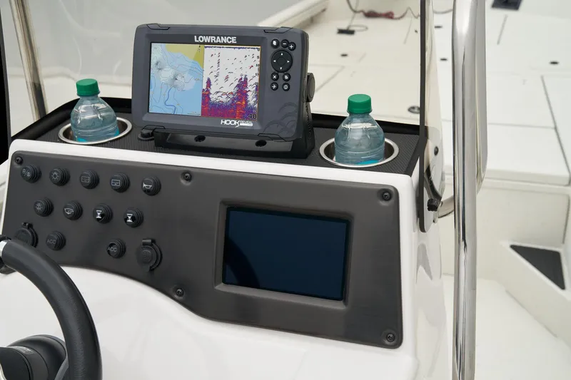 Slide: The Image of Manufacturer Provided Image: Manufacturer Provided Image: 2025 Ranger RB210 boat console with Lowrance fishfinder and dual cup holders. - 43