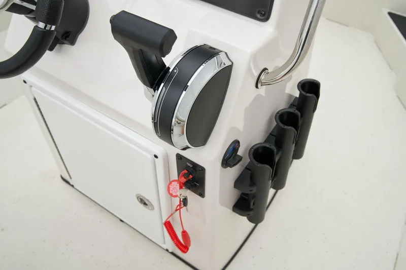 Slide: The Image of Manufacturer Provided Image: Manufacturer Provided Image: Control panel of 2025 Ranger RB210 boat with throttle and rod holders. - 46