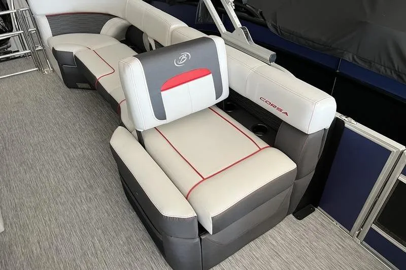 Slide: The Image of 2023 Barletta Corsa 23Q boat interior with stylish seating and modern design. - 12