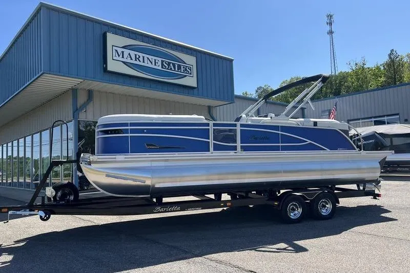 Slide: The Image of 2023 Barletta Corsa 23Q pontoon boat on trailer at Marine Sales dealership. - 27