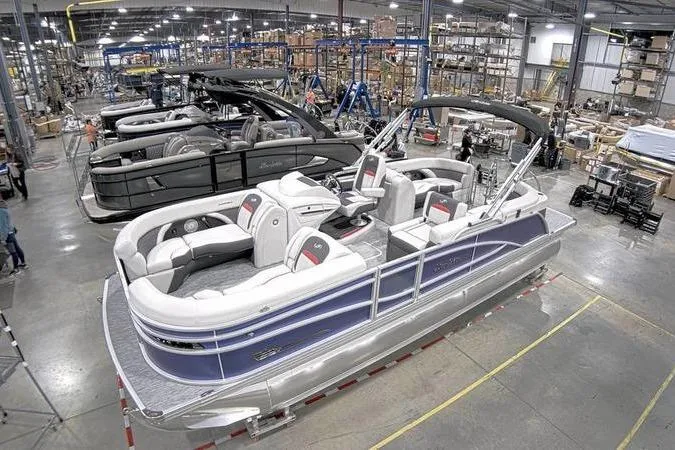 Slide: The Image of 2023 Barletta Corsa 23Q pontoon boat in a manufacturing facility. - 9