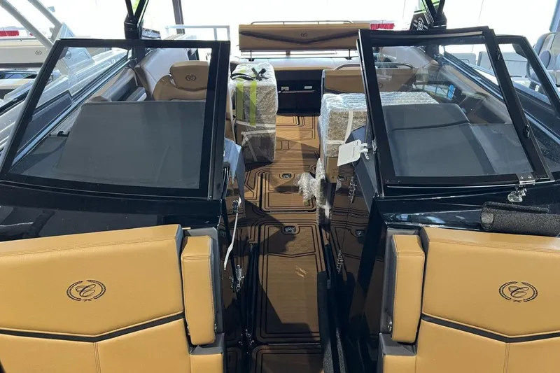 Slide: The Image of 2026 Cobalt R8 Surf boat interior with tan seating and sleek design. - 28