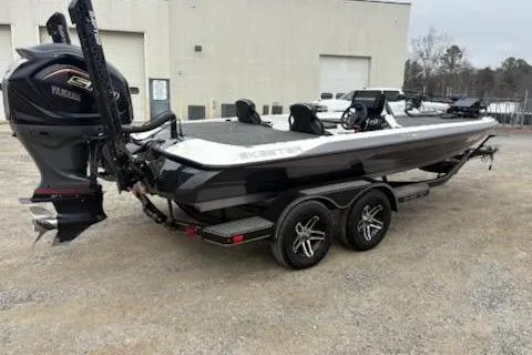 Slide: The Image of 2023 Skeeter ZXR20 boat with Yamaha engine, parked outdoors on a trailer. - 6