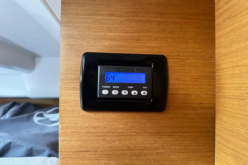 Slide: The Image of Thermostat on 2015 Jeanneau Sun Odyssey 469 yacht, displaying 64 degrees. - 24