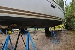 Slide: The Image of 2015 Jeanneau Sun Odyssey 469 sailboat on stands, side view. - 38