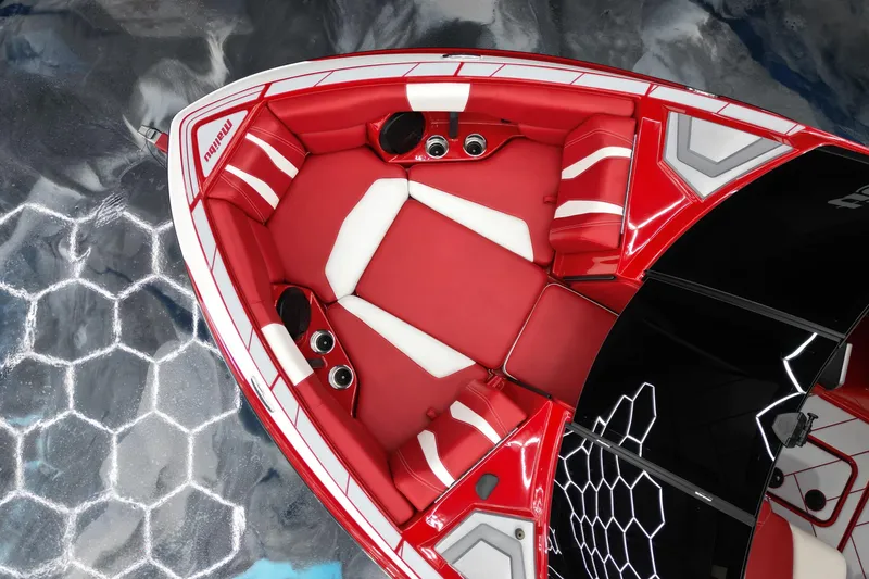 Slide: The Image of 2023 Malibu Wakesetter 22 LSV boat interior with red and white seating. - 5