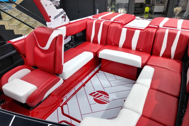 Slide: The Image of 2023 Malibu Wakesetter 22 LSV interior with red and white seating. - 6