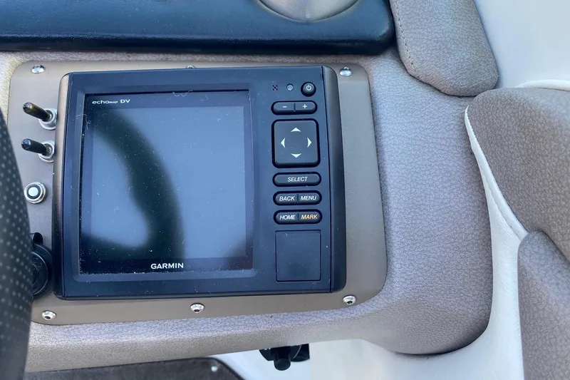 Slide: The Image of Garmin echomap DV on 2004 Cobalt 220 boat dashboard, featuring navigation controls. - 12