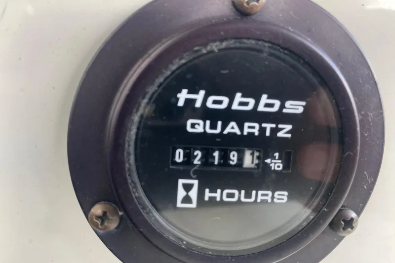 Slide: The Image of Hobbs Quartz hour meter showing 219.1 hours on a 2004 Cobalt 220. - 20