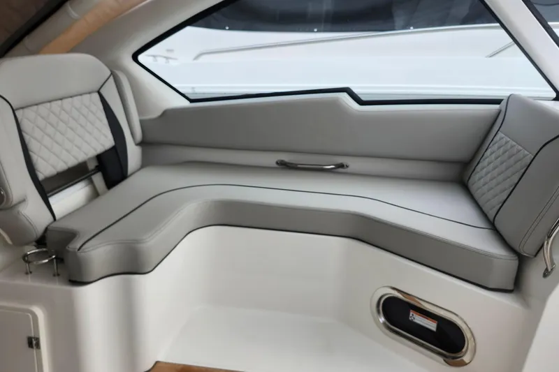 Slide: The Image of Luxurious seating in 2026 Pursuit DC 326 Dual Console boat interior. - 16