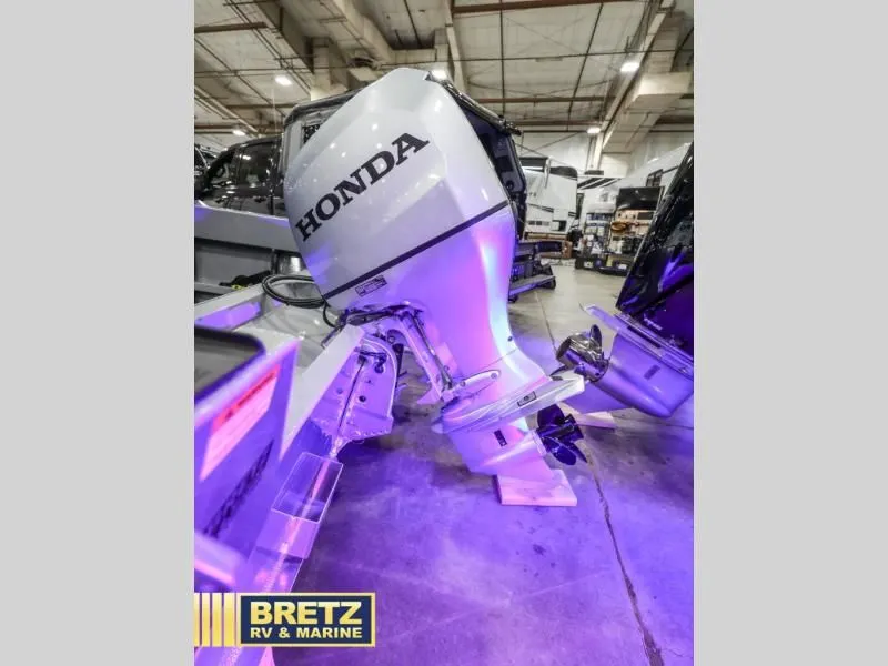 Slide: The Image of Honda outboard motor on a 2026 Hewscraft 160 Sportsman. - 10
