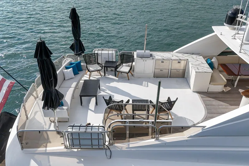 Slide: The Image of Luxurious deck of 2011 Princess 95 Motor Yacht with seating and dining area. - 17