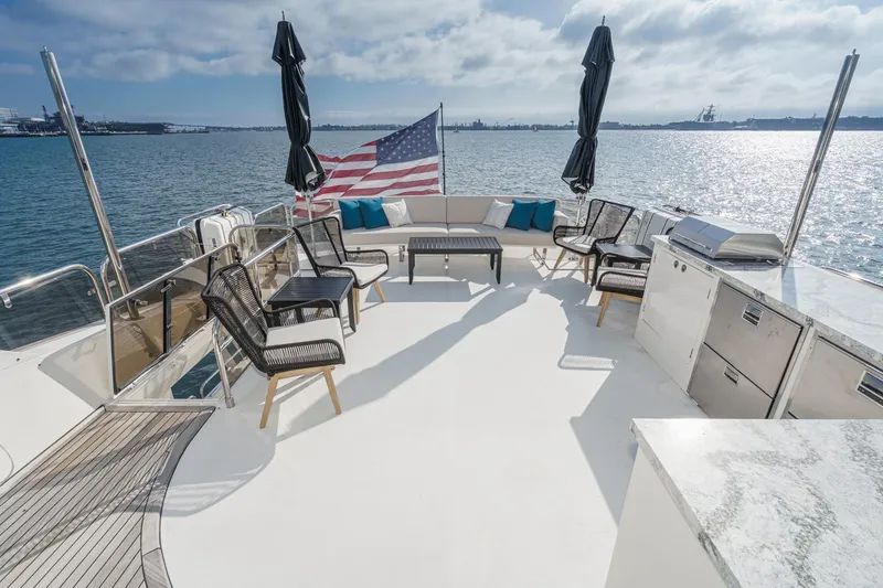 Slide: The Image of Spacious deck of 2011 Princess 95 Motor Yacht with seating and ocean view. - 18