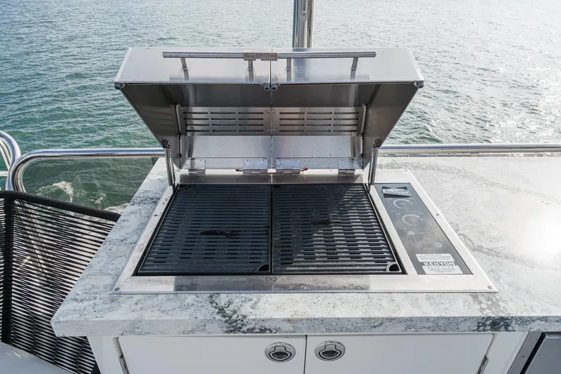 Slide: The Image of Outdoor grill on 2011 Princess 95 Motor Yacht, overlooking the ocean. - 20
