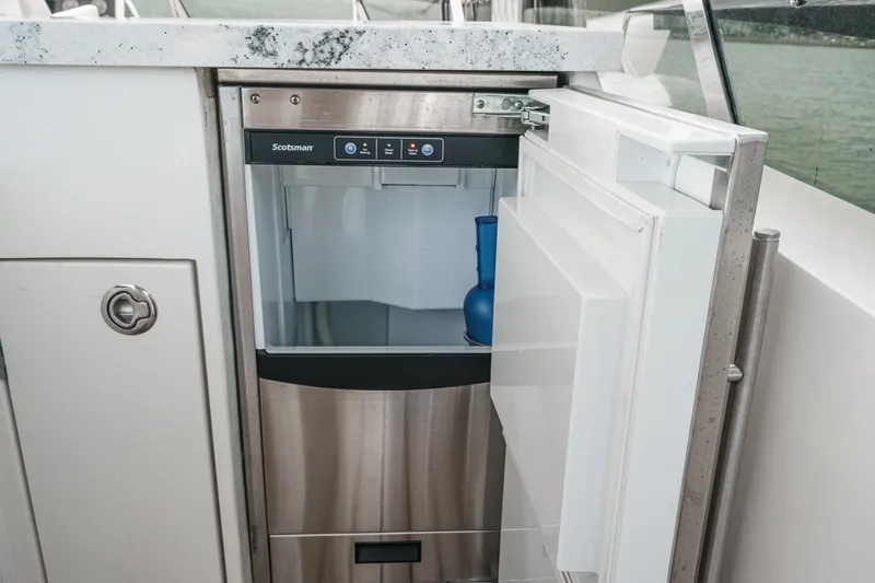 Slide: The Image of Open Scotsman ice maker on 2011 Princess 95 Motor Yacht, showcasing modern amenities. - 27