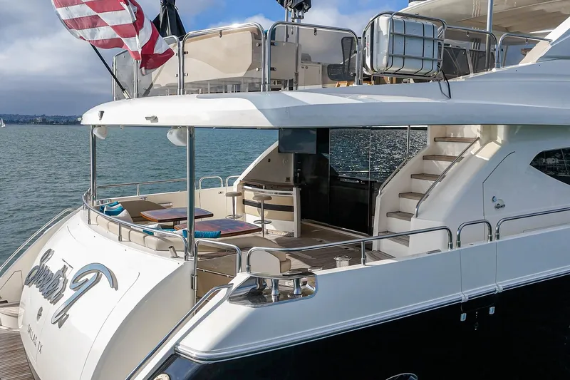 Slide: The Image of Luxurious 2011 Princess 95 Motor Yacht with elegant deck and seating area. - 32