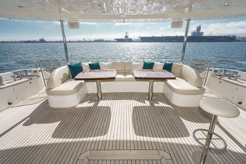 Slide: The Image of Luxurious 2011 Princess 95 Motor Yacht deck with elegant seating and ocean view. - 33