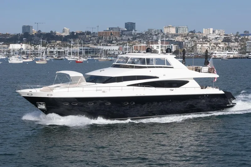 Slide: The Image of Luxurious 2011 Princess 95 Motor Yacht cruising in a scenic harbor setting. - 4