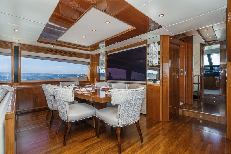 Slide: The Image of Luxurious dining area on 2011 Princess 95 Motor Yacht with elegant wood finishes. - 41
