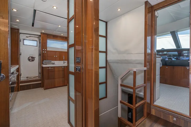 Slide: The Image of Luxurious interior of 2011 Princess 95 Motor Yacht with wood finishes and modern design. - 44