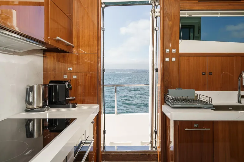 Slide: The Image of Luxurious kitchen interior of 2011 Princess 95 Motor Yacht with ocean view. - 46