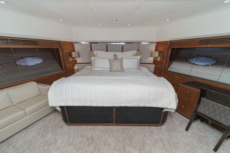 Slide: The Image of Luxurious bedroom interior of 2011 Princess 95 Motor Yacht with elegant furnishings. - 51
