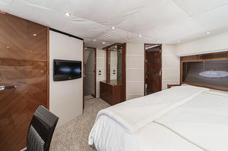 Slide: The Image of Luxurious bedroom interior of 2011 Princess 95 Motor Yacht with modern decor and amenities. - 52
