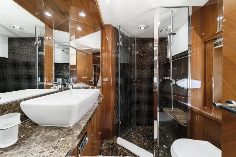 Slide: The Image of Luxurious bathroom on 2011 Princess 95 Motor Yacht with modern fixtures and elegant design. - 54
