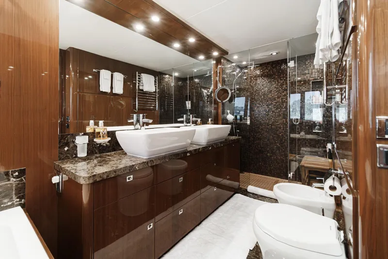 Slide: The Image of Luxurious bathroom in 2011 Princess 95 Motor Yacht with dual sinks and elegant finishes. - 62