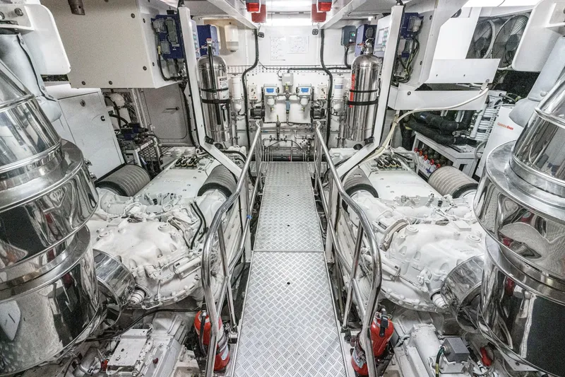 Slide: The Image of Engine room of 2011 Princess 95 Motor Yacht, showcasing advanced machinery and equipment. - 64
