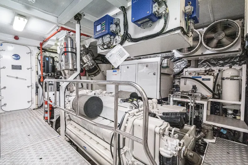 Slide: The Image of Engine room of 2011 Princess 95 Motor Yacht, featuring advanced machinery and equipment. - 67