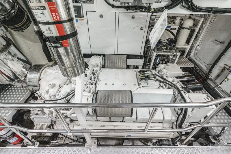 Slide: The Image of Engine room of 2011 Princess 95 Motor Yacht, featuring advanced machinery and safety equipment. - 70