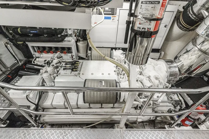 Slide: The Image of Engine room of a 2011 Princess 95 Motor Yacht, showcasing machinery and equipment. - 71