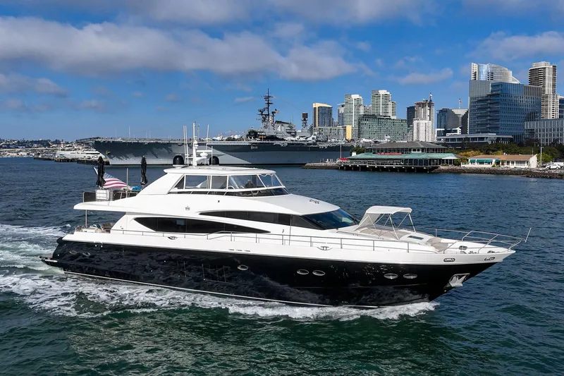 Slide: The Image of Luxury 2011 Princess 95 Motor Yacht cruising near city skyline and naval ship. - 8