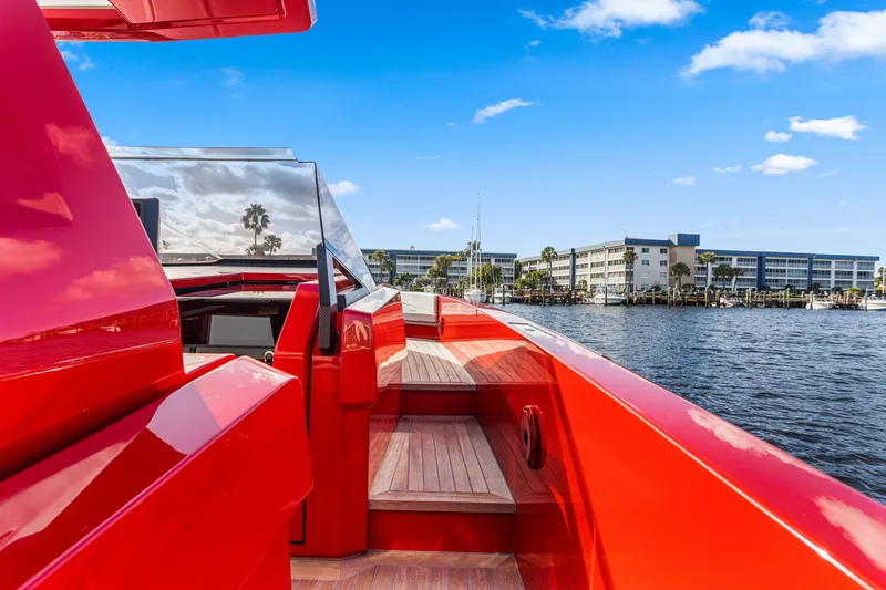 Slide: The Image of Red 2021 Wally 48 yacht on water, modern design, clear blue sky background. - 19