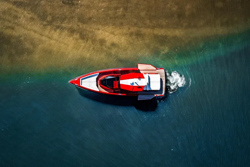 Slide: The Image of Aerial view of 2021 Wally 48 boat in clear blue water. - 3