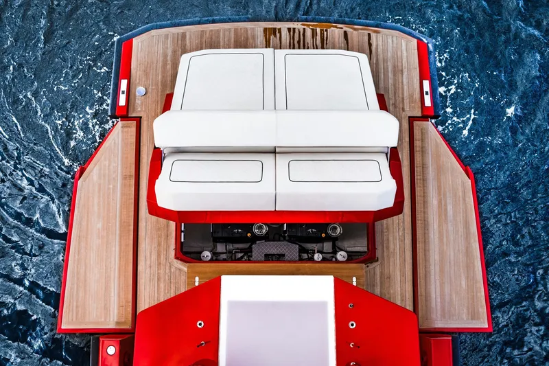 Slide: The Image of Top view of 2021 Wally 48 yacht with red accents and wooden deck. - 33