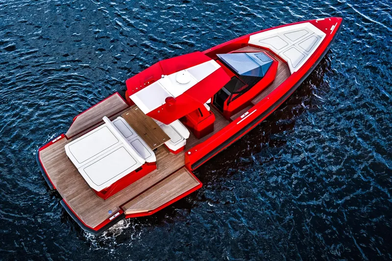 Slide: The Image of Red 2021 Wally 48 yacht with sleek design on blue water. - 38