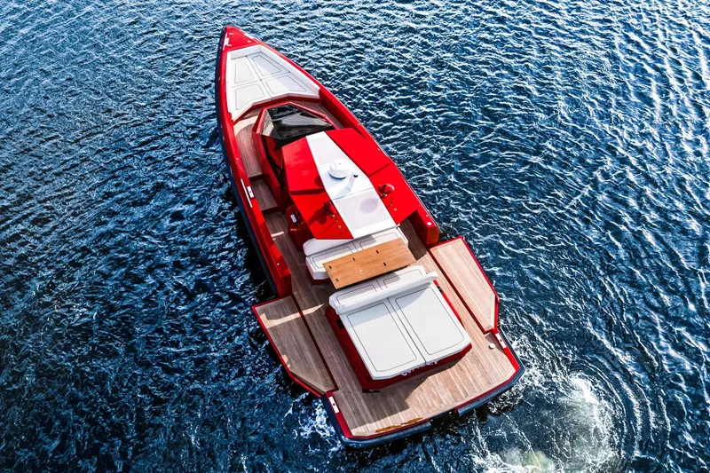 Slide: The Image of Red 2021 Wally 48 yacht on blue water, aerial view. - 40