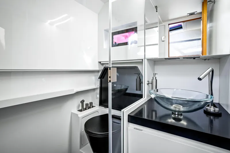 Slide: The Image of Modern bathroom in 2021 Wally 48 yacht with glass sink and sleek fixtures. - 46
