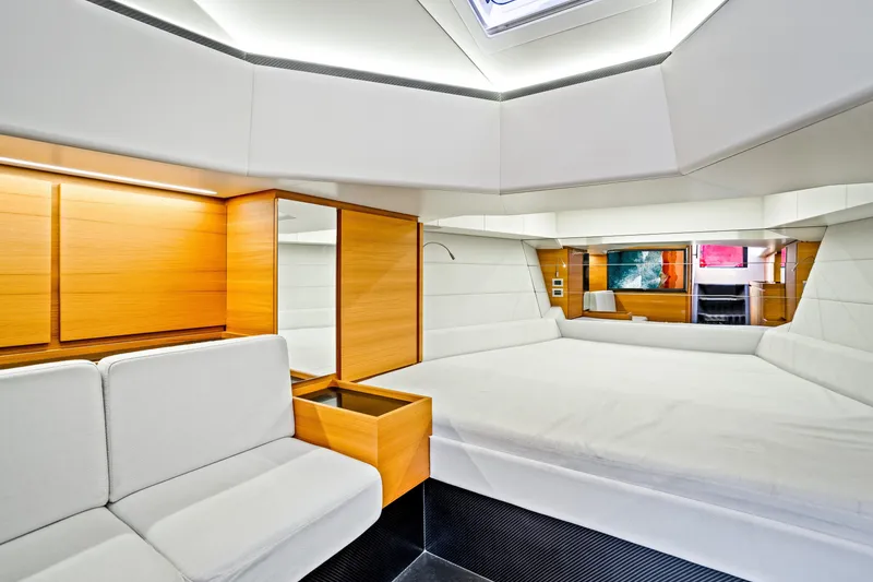 Slide: The Image of Luxurious interior of 2021 Wally 48 yacht with modern design and wooden accents. - 48