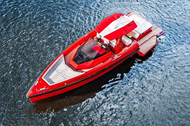 Slide: The Image of Red 2021 Wally 48 yacht on water, showcasing sleek design and modern features. - 7