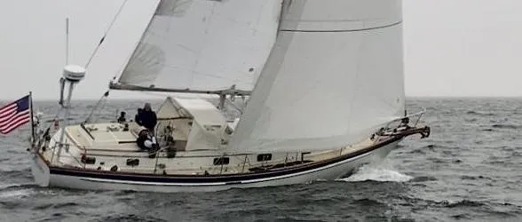 The Image of Sailing yacht Chuck Paine Intrepid 40 Center Cockpit, 1985, navigating choppy waters. - 0
