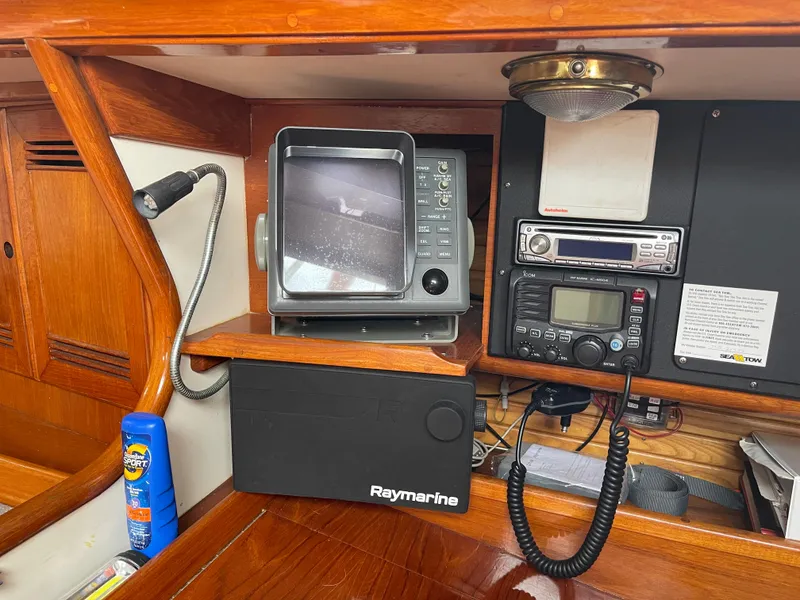 Slide: The Image of Navigation equipment in a 1985 Chuck Paine Intrepid 40 Center Cockpit sailboat. - 11