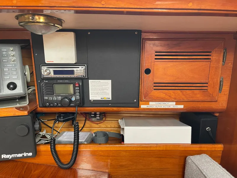 Slide: The Image of Navigation equipment in 1985 Chuck Paine Intrepid 40 Center Cockpit sailboat interior. - 12
