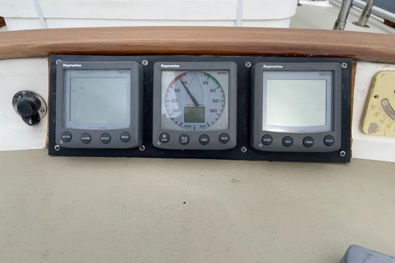 Slide: The Image of Instrument panel on a 1985 Chuck Paine Intrepid 40 Center Cockpit sailboat. - 24