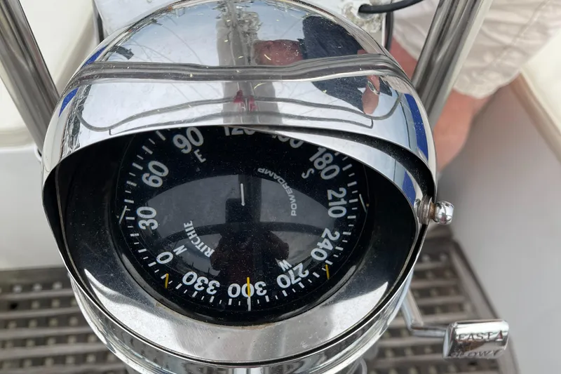 Slide: The Image of Compass on 1985 Chuck Paine Intrepid 40 Center Cockpit sailboat, showing navigation details. - 27