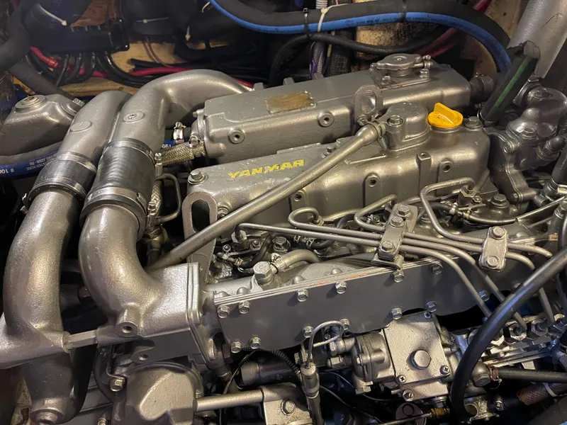 Slide: The Image of Yanmar engine in a 1985 Chuck Paine Intrepid 40 Center Cockpit sailboat. - 31