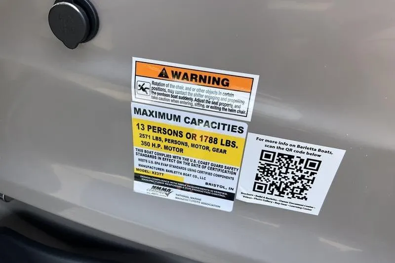 Slide: The Image of 2024 Barletta Corsa 23U capacity warning label, 13 persons or 1788 lbs, with QR code. - 16